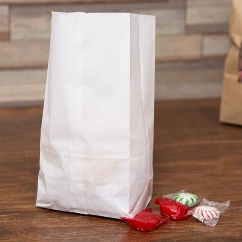 4 5/16" x 2 7/16" x 7 7/8" White Paper Bag, 500 case