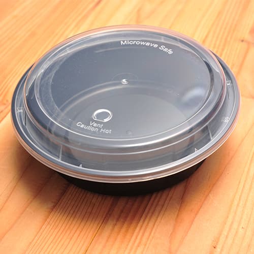 24 oz. Black 7 1/2" Round Microwavable Heavy Weight Container with Lid